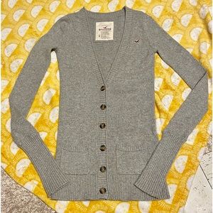 Hollister women’s gray button up sweater, size Small.